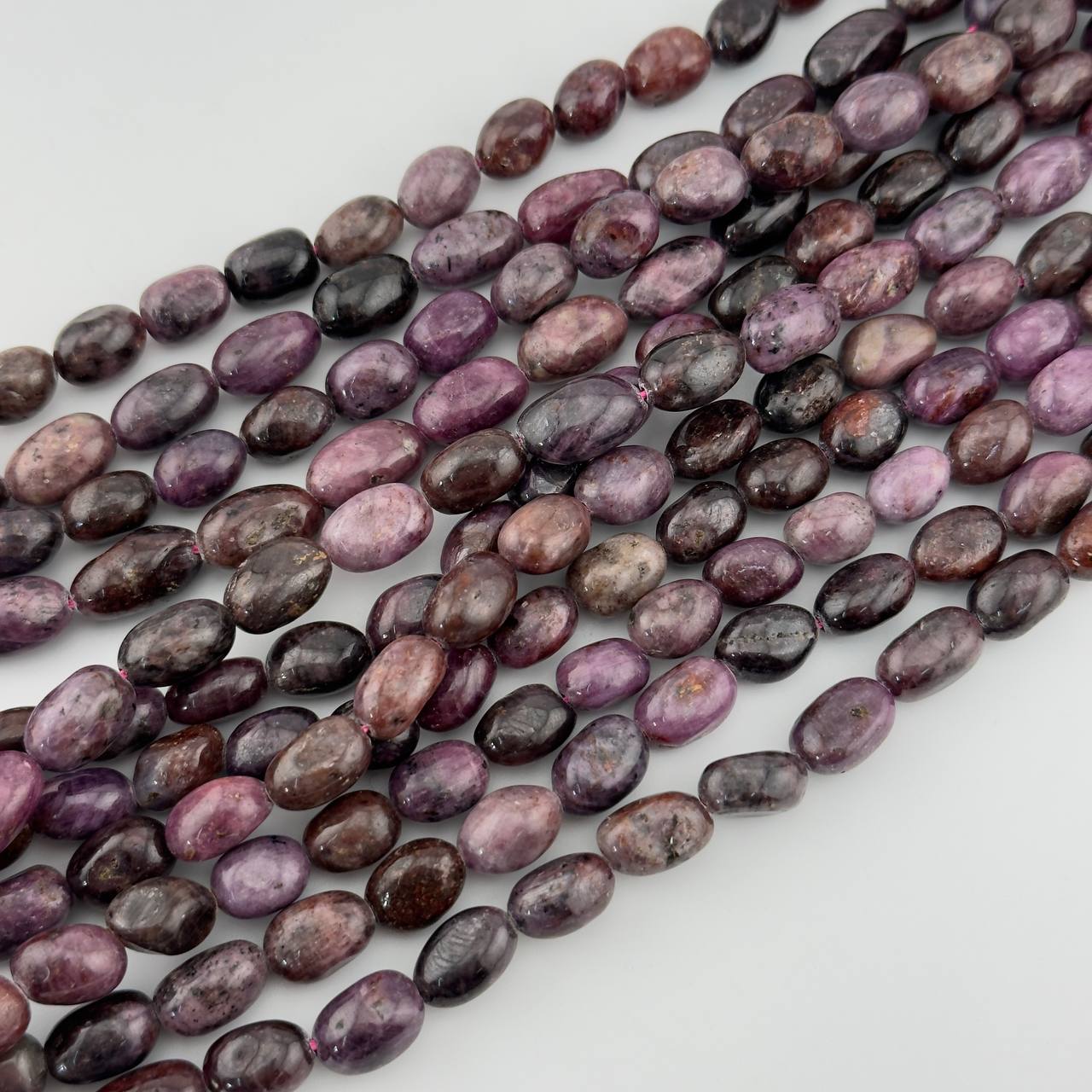 Бусины Родонит размер 8*12мм натуральный камень